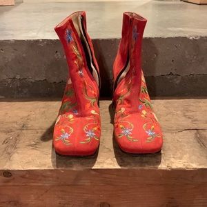 Red booties with floral design
